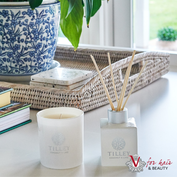 Tilley - Pink Lychee Candle & Reed Diffuser on coffee table 