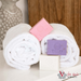 soap trio on towel pink purple and white