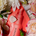 HIDEHERE - Vita Elixir Serum - 25ml close up with flowers
